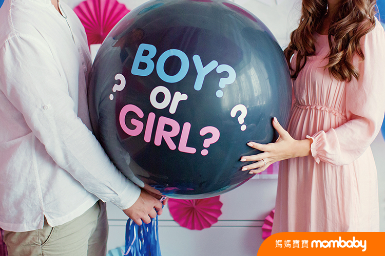 Man,And,Woman,Holding,Black,Balloon,With,"boy,Or,Girl?"