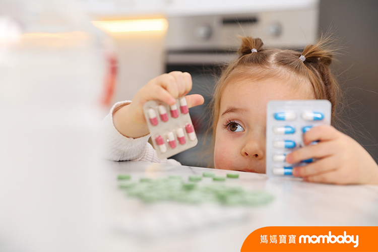 Child,Safety,At,Home.,Little,Girl,Playing,With,Pills,At